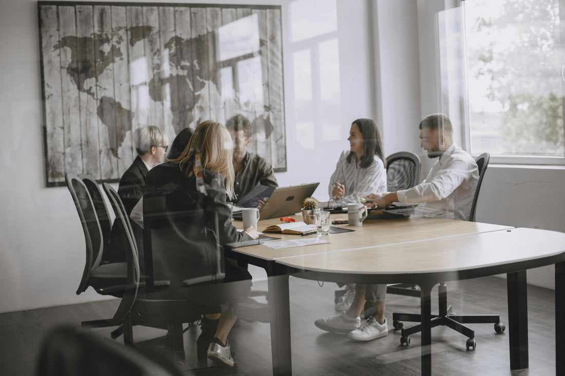 HR manager reviewing psychosocial hazard checklist with team